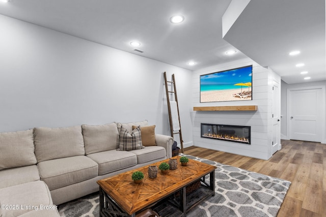 6331 Mistflower Cir, Prospect, KY 40059 - living room featuring wood finished floors, recessed lighting, and a fireplace