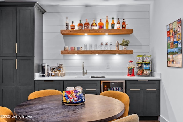 6331 Mistflower Cir, Prospect, KY 40059 - indoor wet bar featuring beverage cooler and baseboards