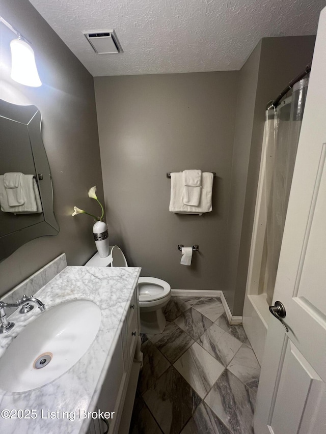 12112 Alpine Way, Goshen, KY 40026 - bathroom featuring vanity, marble finish floors, a textured ceiling, and shower / bathtub combination with curtain