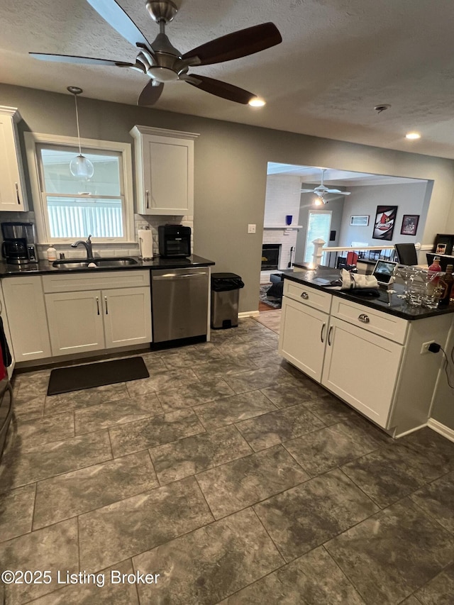 12112 Alpine Way, Goshen, KY 40026 - kitchen featuring dishwasher, a ceiling fan, dark countertops, white cabinets, and a textured ceiling