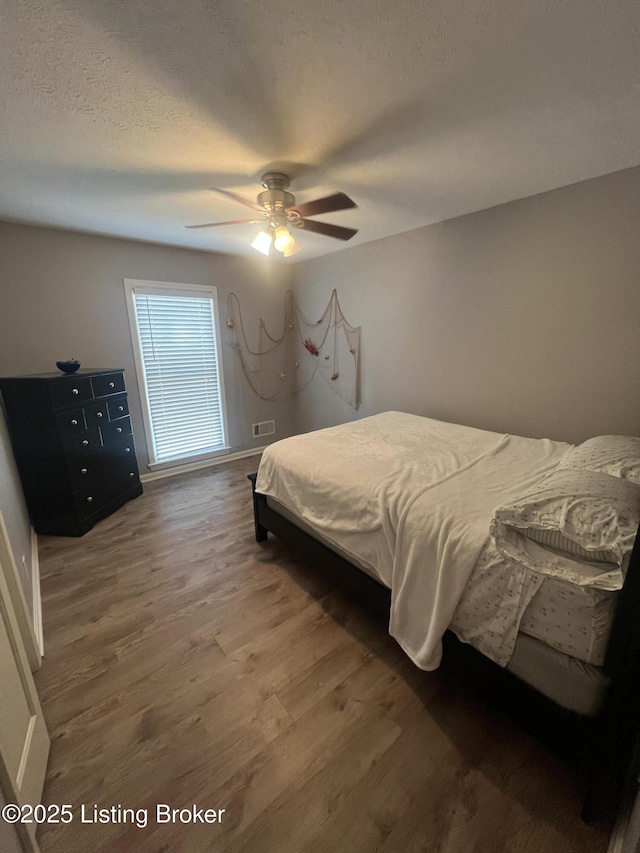 12112 Alpine Way, Goshen, KY 40026 - bedroom with wood finished floors, a textured ceiling, and a ceiling fan