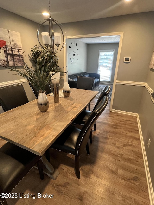 12112 Alpine Way, Goshen, KY 40026 - dining space with wood finished floors and a chandelier