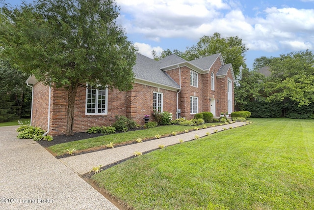 7005 New Bern Ct, Prospect, KY 40059 - view of front of home with a front yard, brick siding, and roof with shingles