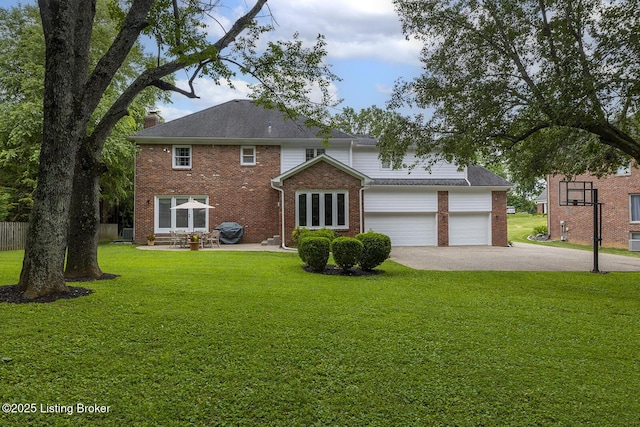 7005 New Bern Ct, Prospect, KY 40059 - back of house featuring brick siding, a chimney, concrete driveway, and an attached garage
