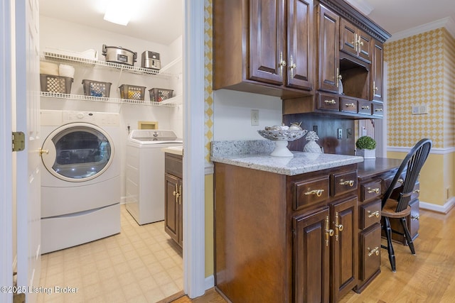 7005 New Bern Ct, Prospect, KY 40059 - laundry area with washing machine and dryer, light flooring, crown molding, wallpapered walls, and a desk