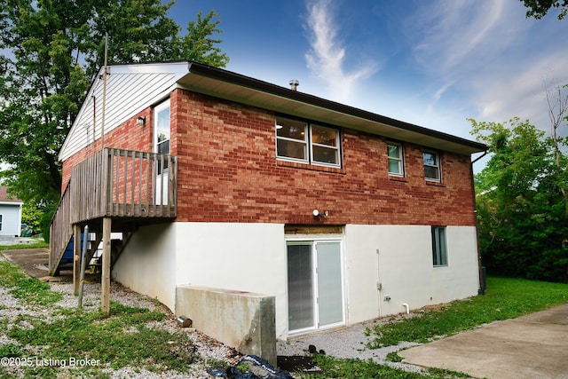 1397 Dotland Cir, Shelbyville, KY 40065 - back of house featuring stairs, brick siding, and a deck