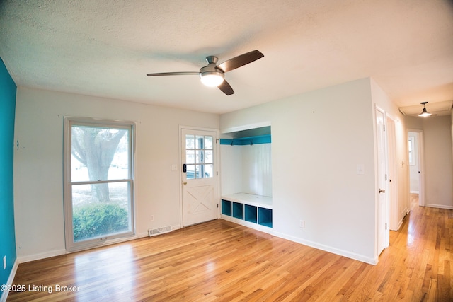 1397 Dotland Cir, Shelbyville, KY 40065 - empty room featuring a ceiling fan, light wood-style floors, and a textured ceiling