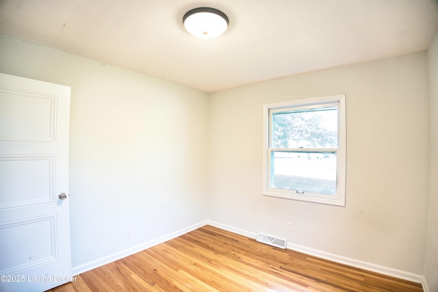 1397 Dotland Cir, Shelbyville, KY 40065 - spare room featuring light wood-style flooring and baseboards
