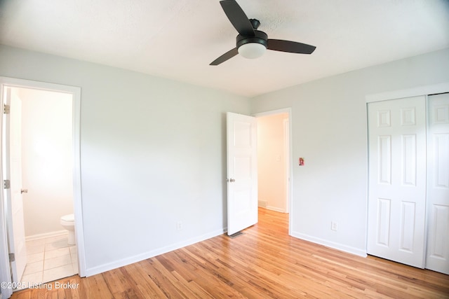 1397 Dotland Cir, Shelbyville, KY 40065 - unfurnished bedroom with light wood-style floors, a closet, ensuite bathroom, and a ceiling fan