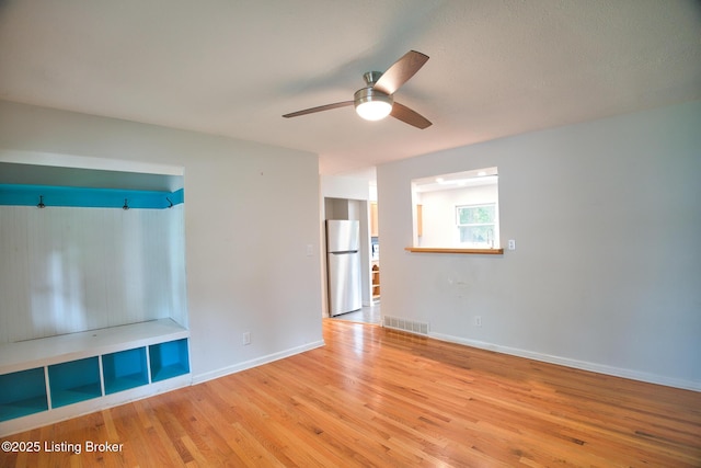 1397 Dotland Cir, Shelbyville, KY 40065 - unfurnished living room with wood finished floors and a ceiling fan