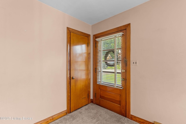 1715 Marlow Rd, Louisville, KY 40216 - doorway with light colored carpet and baseboards