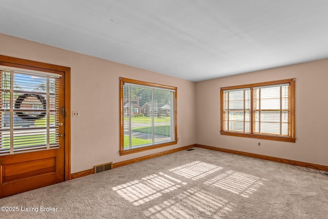 1715 Marlow Rd, Louisville, KY 40216 - unfurnished room with carpet floors and plenty of natural light