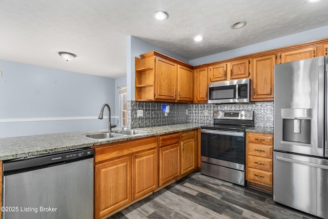 304 Doe Run, Sellersburg, IN 47172 - kitchen with stainless steel appliances, open shelves, dark wood finished floors, backsplash, and recessed lighting