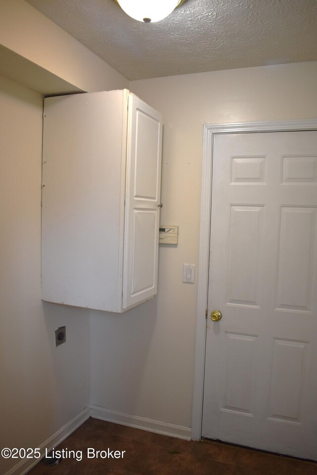 304 Doe Run, Sellersburg, IN 47172 - washroom featuring electric dryer hookup and a textured ceiling