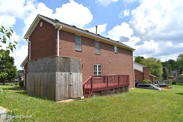 304 Doe Run, Sellersburg, IN 47172 - rear view of property featuring brick siding, a wooden deck, and a lawn