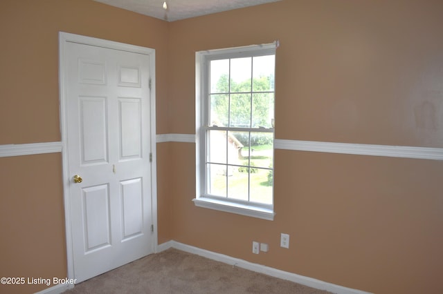 304 Doe Run, Sellersburg, IN 47172 - unfurnished bedroom featuring carpet and baseboards