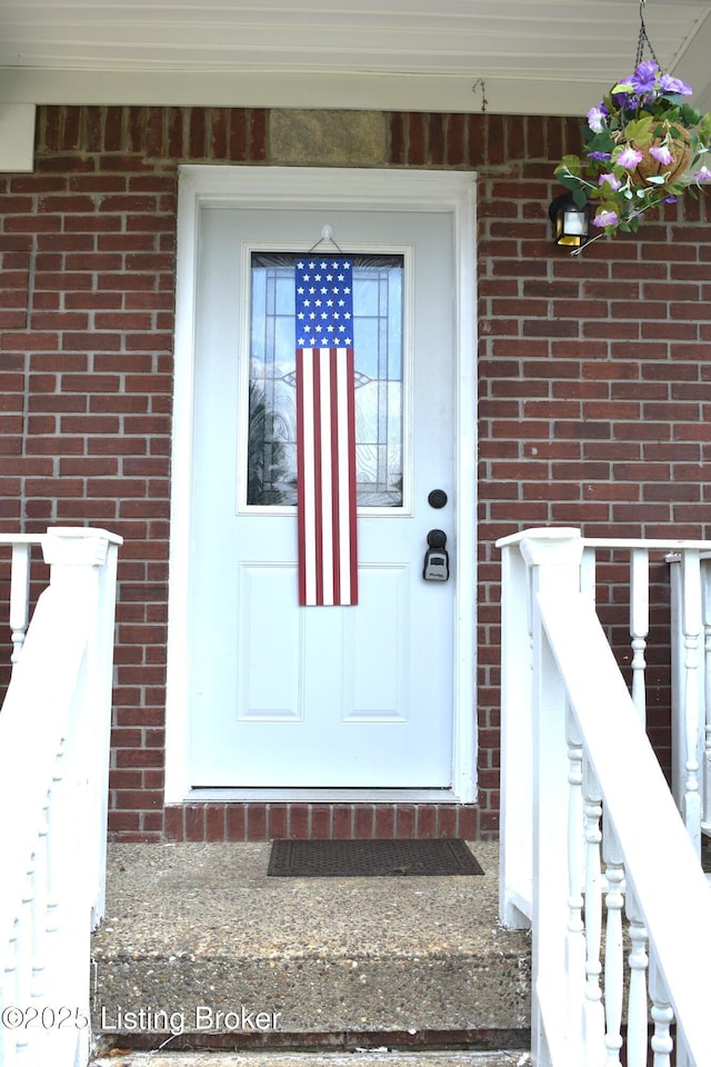 304 Doe Run, Sellersburg, IN 47172 - property entrance featuring brick siding
