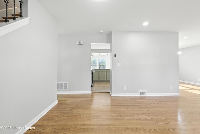 6505 Ridge Cliff Rd, Hollow Creek, KY 40228 - empty room featuring light wood-type flooring and recessed lighting