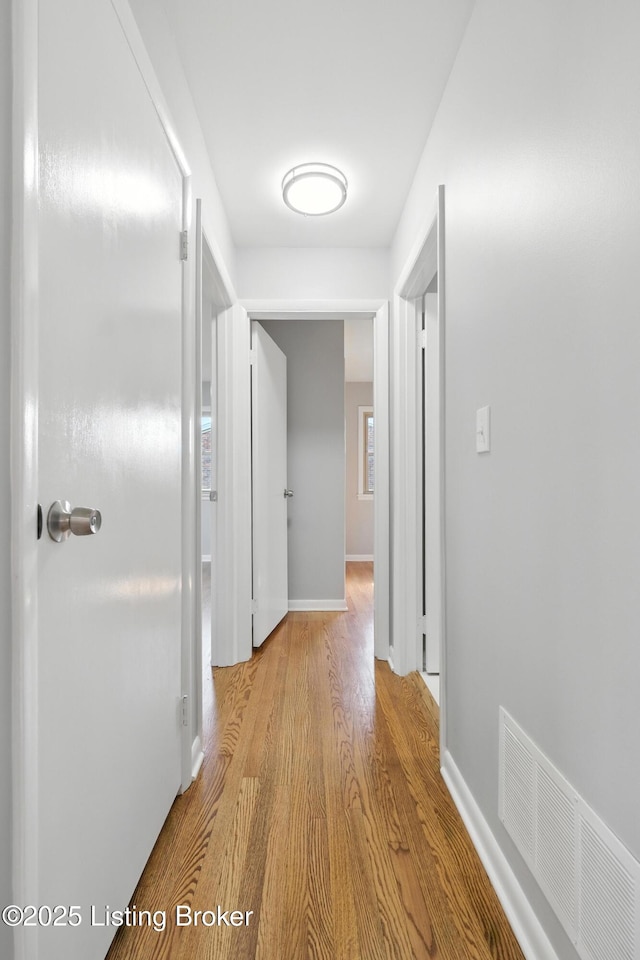 6505 Ridge Cliff Rd, Hollow Creek, KY 40228 - corridor featuring wood finished floors and baseboards