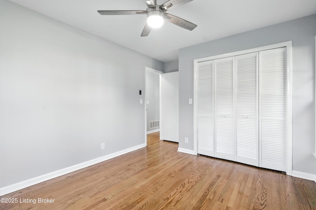 6505 Ridge Cliff Rd, Hollow Creek, KY 40228 - unfurnished bedroom with light wood finished floors, a closet, and ceiling fan