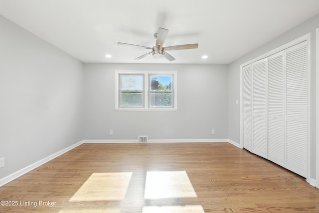 6505 Ridge Cliff Rd, Hollow Creek, KY 40228 - unfurnished bedroom with light wood-style floors, recessed lighting, a closet, and a ceiling fan
