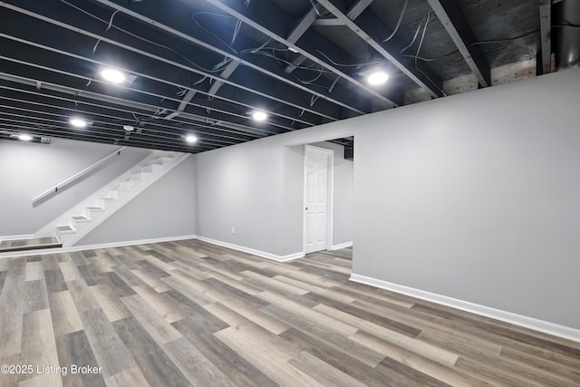 6505 Ridge Cliff Rd, Hollow Creek, KY 40228 - finished basement with wood finished floors and stairway