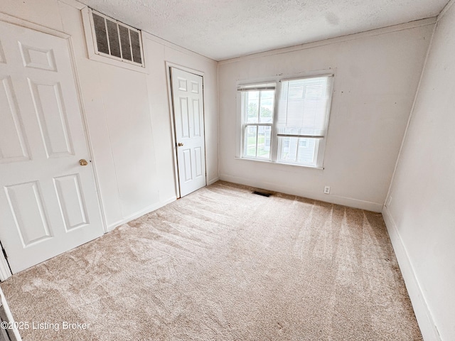 108 Bruce St, Lebanon Junction, KY 40150 - unfurnished bedroom with carpet and a textured ceiling