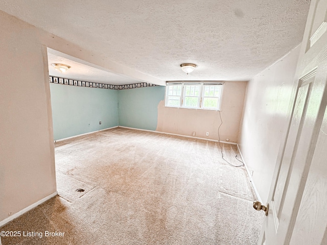 108 Bruce St, Lebanon Junction, KY 40150 - carpeted empty room with baseboards and a textured ceiling