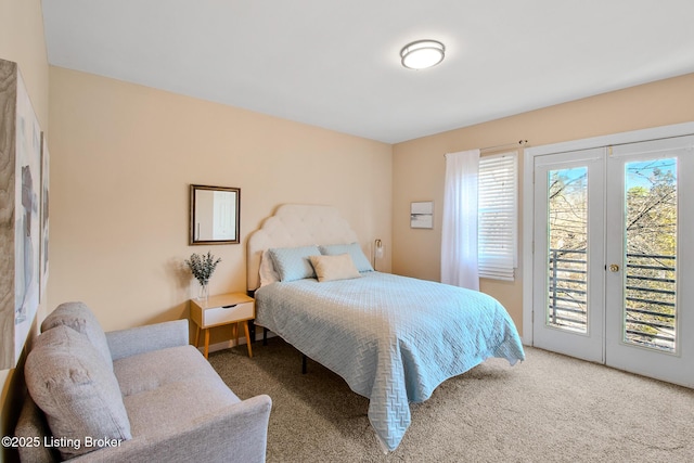 152 N Ewing Ave, Louisville, KY 40206 - carpeted bedroom with access to exterior and french doors