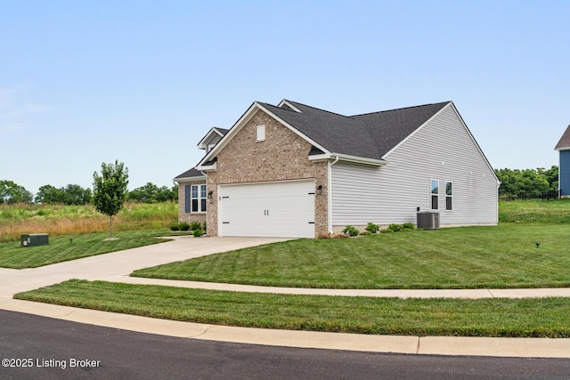 3001 Opal Dr, Shelbyville, KY 40065 - view of home's exterior featuring driveway, brick siding, a garage, and a yard