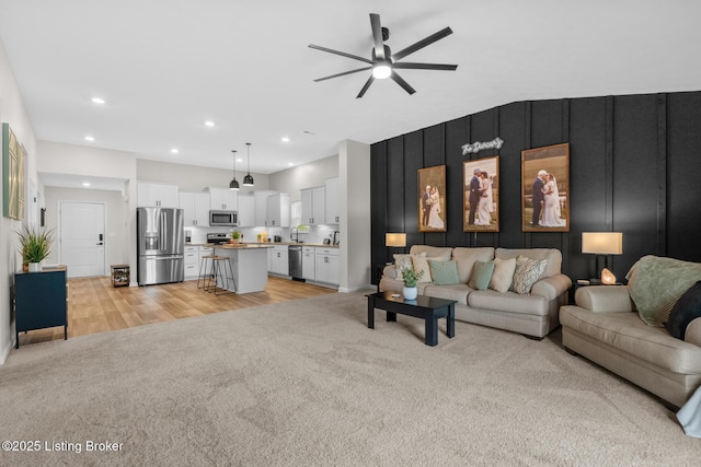 3001 Opal Dr, Shelbyville, KY 40065 - living area featuring light carpet, a ceiling fan, recessed lighting, and light wood finished floors