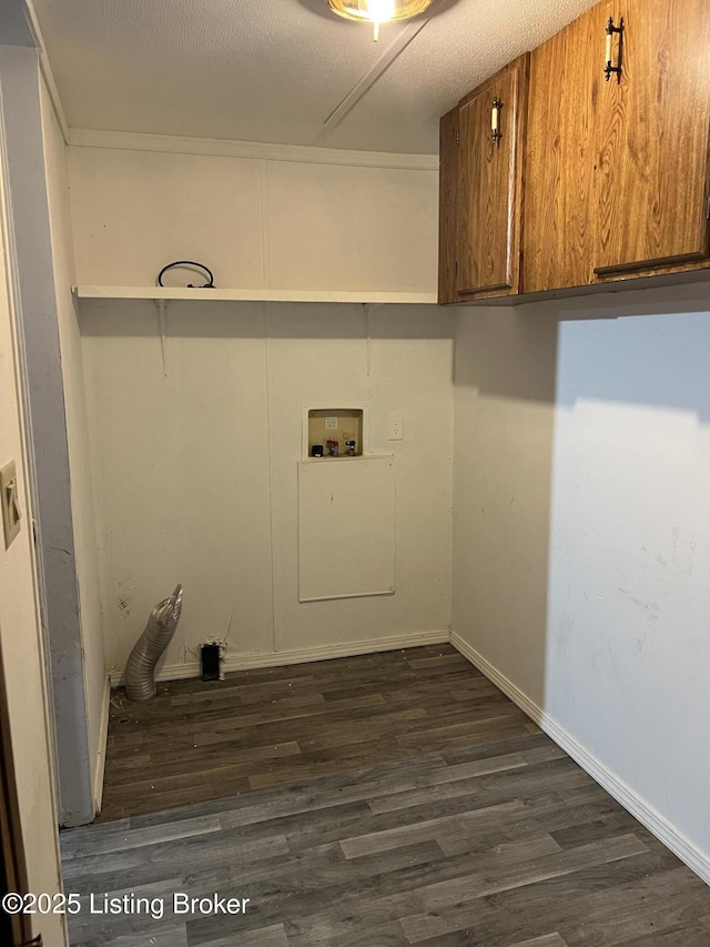 140 Bluegrass Dr, Taylorsville, KY 40071 - laundry room featuring cabinet space, dark wood-type flooring, washer hookup, and a textured ceiling