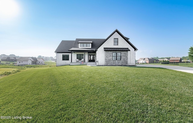 121 Liam Ct, Shepherdsville, KY 40165 - modern farmhouse featuring a front lawn and brick siding