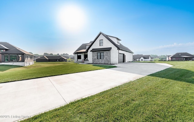 121 Liam Ct, Shepherdsville, KY 40165 - view of front of home featuring driveway, a garage, a front yard, and a residential view