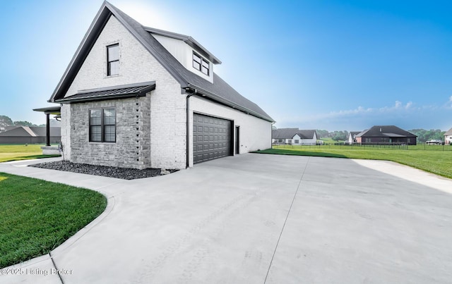 121 Liam Ct, Shepherdsville, KY 40165 - view of side of home featuring concrete driveway, a garage, a yard, brick siding, and stone siding