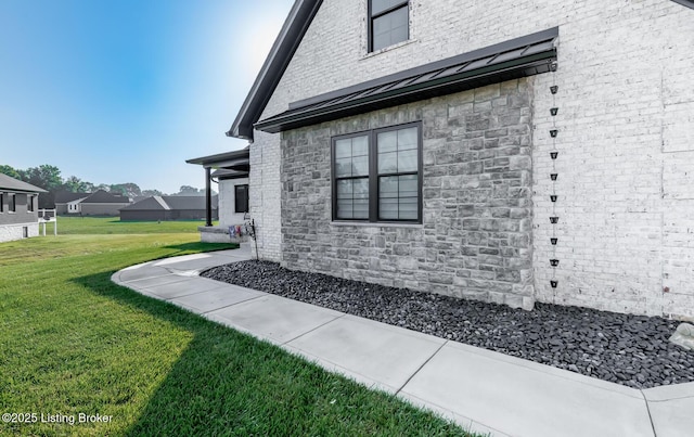 121 Liam Ct, Shepherdsville, KY 40165 - view of property exterior with stone siding and a lawn