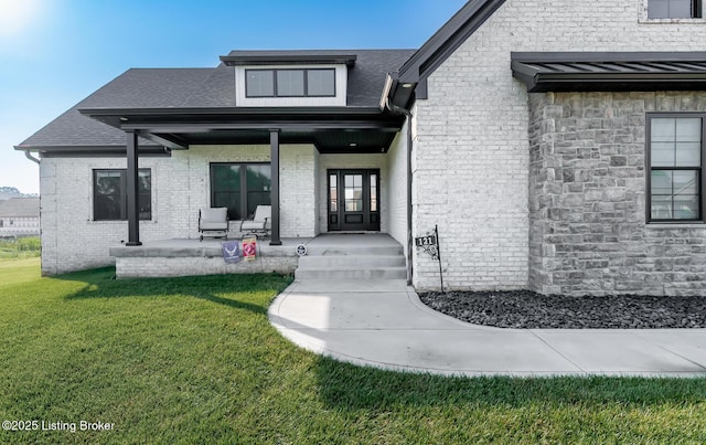 121 Liam Ct, Shepherdsville, KY 40165 - entrance to property with a porch, a lawn, brick siding, and a shingled roof