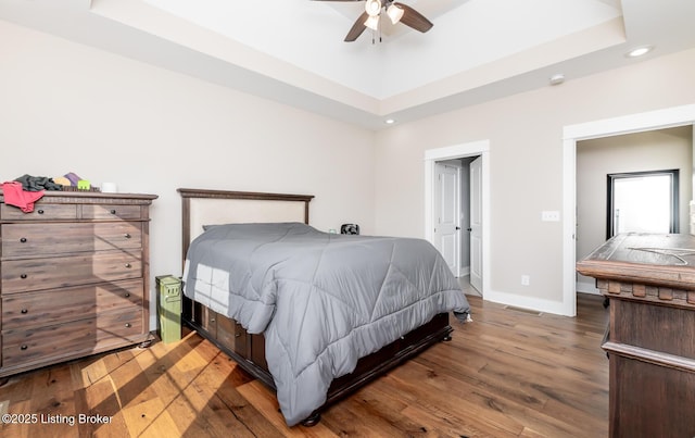121 Liam Ct, Shepherdsville, KY 40165 - bedroom with a tray ceiling, wood finished floors, recessed lighting, and ceiling fan