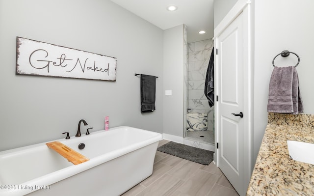 121 Liam Ct, Shepherdsville, KY 40165 - bathroom featuring a soaking tub, recessed lighting, tiled shower, and vanity