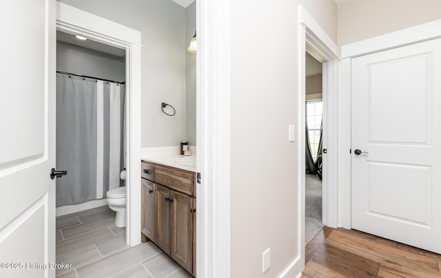 121 Liam Ct, Shepherdsville, KY 40165 - full bath with vanity, wood finished floors, and a shower with shower curtain