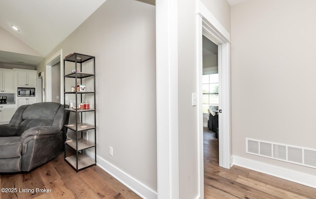 121 Liam Ct, Shepherdsville, KY 40165 - sitting room with light wood finished floors and vaulted ceiling