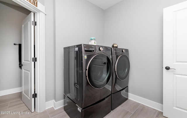 121 Liam Ct, Shepherdsville, KY 40165 - laundry room featuring washing machine and dryer and light wood-style flooring