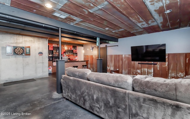 121 Liam Ct, Shepherdsville, KY 40165 - living area featuring concrete floors and a bar