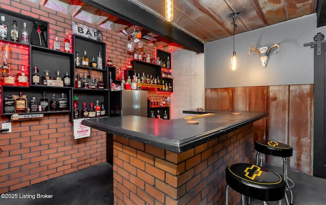 121 Liam Ct, Shepherdsville, KY 40165 - indoor wet bar with finished concrete floors and freestanding refrigerator