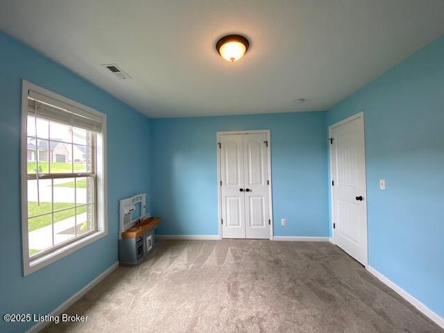121 Redwood Dr, Bardstown, KY 40004 - unfurnished bedroom featuring a closet and carpet floors