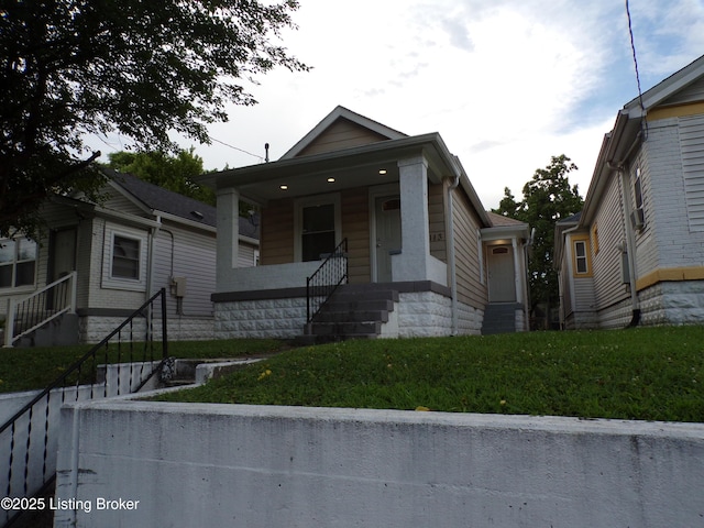 2113 Dumesnil St, Louisville, KY 40210 - shotgun-style home with a porch and entry steps