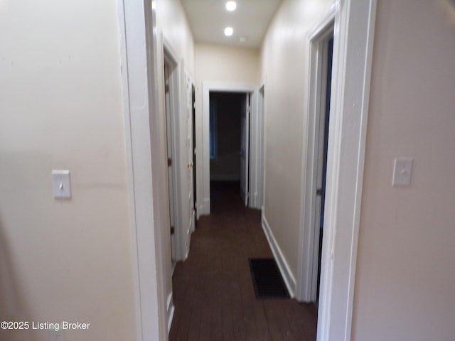 2113 Dumesnil St, Louisville, KY 40210 - corridor featuring dark wood-type flooring and baseboards