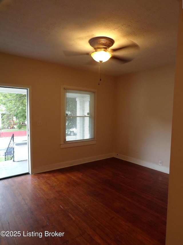 2113 Dumesnil St, Louisville, KY 40210 - spare room with dark wood-type flooring and a ceiling fan