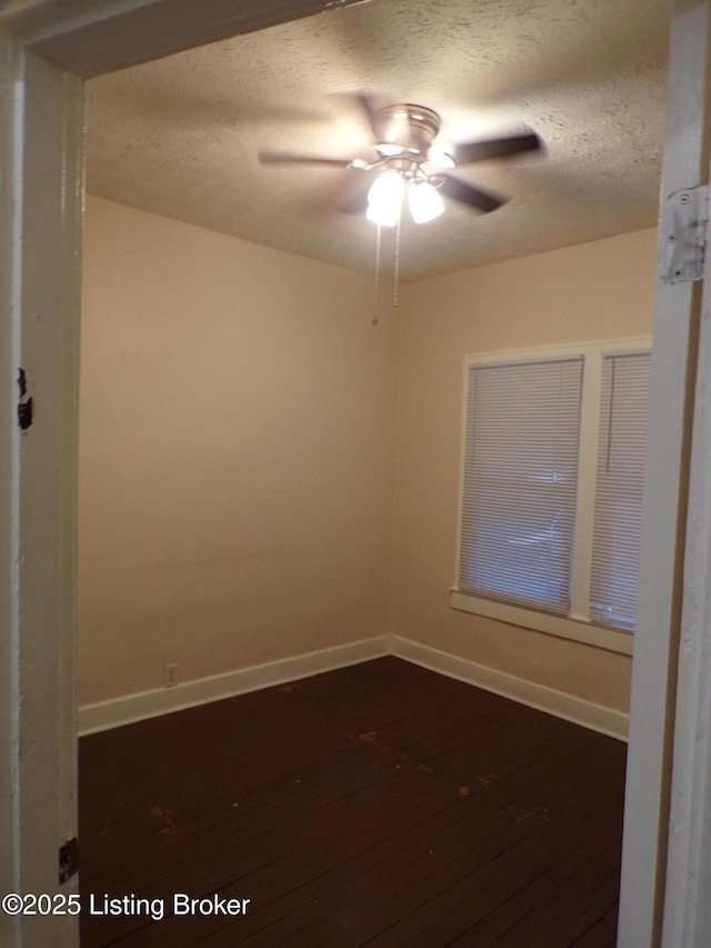 2113 Dumesnil St, Louisville, KY 40210 - unfurnished room with ceiling fan, a textured ceiling, and dark wood-style flooring