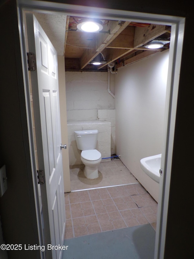 2113 Dumesnil St, Louisville, KY 40210 - bathroom with toilet and tile patterned flooring